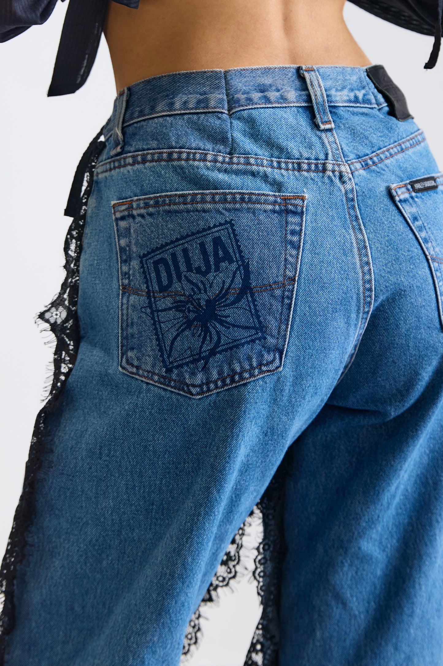 REWORKED HARLEY DENIMS W LACE DETAIL